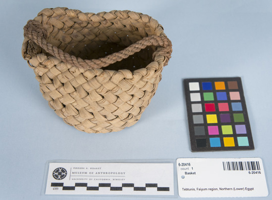 Hearst Museum object titled Basket, accession number 6-20416, described as Round basket, rope handle. Roman tomb.