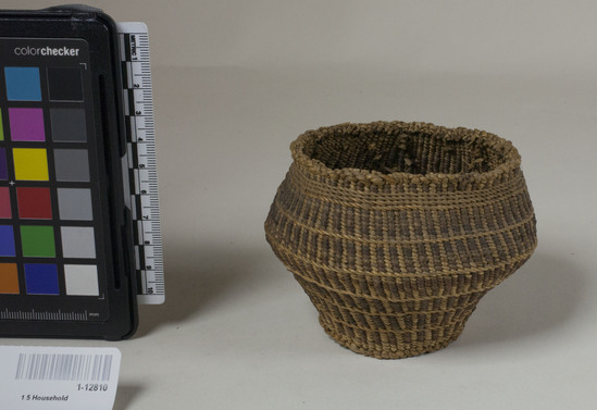 Hearst Museum object 2 of 2 titled Food basket, accession number 1-12810, described as Food basket; twined. Warp and weft are twisted Tule (Schoenoplectus acutus). Red pattern is Tule root. Indigenous name: maksha.  Very small.