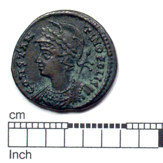 Hearst Museum object titled Coin: æ, accession number 8-5501, described as Coin; AE; Roman. 2.90 grams, diameter 18 mm. Istanbul, Turkey. Obverse: CONSTANTINOPOLIS, female bust l.laureate, helmeted, mantled, holding scepter. Reverse: Victory standing facing l., right foot resting on the prow of a ship, holding scepter; behind, a shield; in exergue, SMALA. Remarks: "City of Constantinople, under Constantine the Great, son, or grandson.