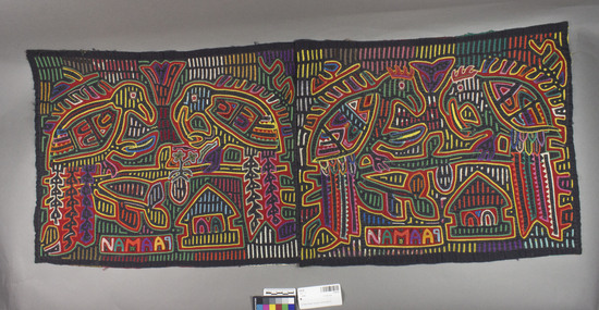 Hearst Museum object titled Mola, accession number 3-30192, described as Molas; unmatched pair; loosely attached together), old and previously used, pair of bird creatures on each side, each of the 4 bird has different tail feathers; birds on one side have combs on their head and short and long tail feathers; birds on the other side have no combs and long dangling tail feathers; each of the birds appear to be holding or eating a banana; there is a hut on each side below the birds, along with the word "PANAMA" written backwards.