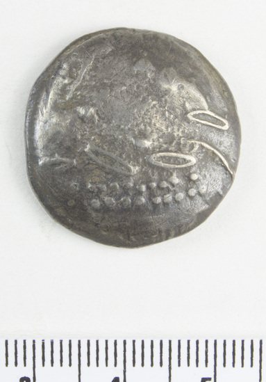 Hearst Museum object 2 of 6 titled Coin: ar tetradrachm (barbarous imitation), accession number 8-4488, described as Coin; AR; Tetradrachm; Greek. 13.63 grams, 25 mm. Obverse: traces of head l. laureate. Reverse: Horseman r. Remarks: "Barbarous imitation of Philip II