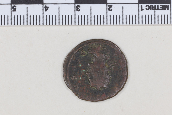 Hearst Museum object 7 of 8 titled Coin: æ antoninianus, accession number 8-6260, described as Coin: Æ; AR? CIA UDIUS.GOTHICUS- 3.42 grams. Antoninianus. Obverse: ...VS...G - bust facing right, radiate, draped Reverse: illegible.