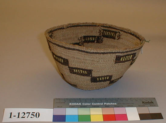 Hearst Museum object titled Basket, accession number 1-12750, described as Food basket; twined. Warp is twisted Tule (Schoenoplectus acutus), weft is twisted Tule and Cattail (Typha latifolia). White pattern is Reed (Phragmites vulgaris). Brown color is Tule root. Yellow dye is Porcupine quills (Erethizon dorsatum) in Wolf lichen (Letharia vulpina). Red and yellow parallelograms in diagonal pattern. Indigenous name: maska.