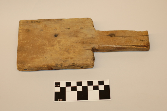 Hearst Museum object titled Pot shaper, accession number 3-3043, described as Paddle, wood, sawn from crate; nail and nail holes still present; L 25.2 cm x w 11.3 cm