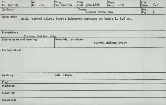 Documentation associated with Hearst Museum object titled Zoomorph, accession number 2-6107, described as Seal carved of walrus ivory.  Engraved markings on back.