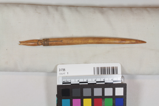 Hearst Museum object titled Awl, accession number 2-735, described as Ivory, fish-shaped handle, tip broken.