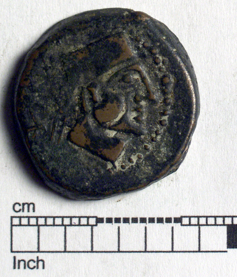 Hearst Museum object titled Coin: æ, accession number 8-5951, described as Coin: Æ; II Century B.C. Obverse: Head facing right, wearing hat. Reverse: star within wreath.