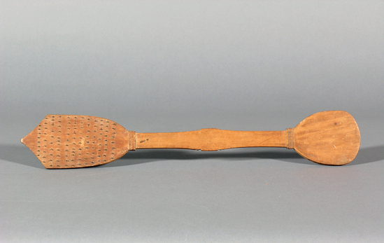 Hearst Museum object titled Grater, accession number 16-7489, described as Grater; made of wood; one end embedded with wires.  For grating manioc and sweet potato.  Bits of wire driven in.  Made by men, used by women, chiefly by chincha.  48.5 cm long.