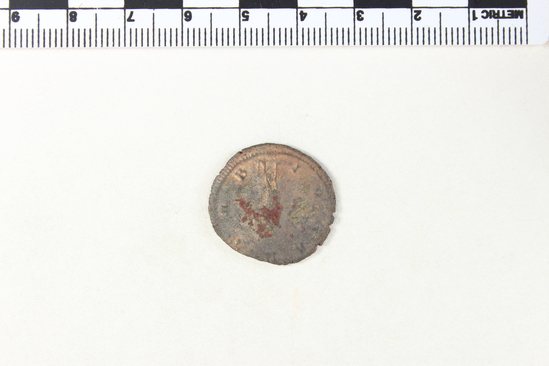 Hearst Museum object 7 of 8 titled Coin: billon antoninianus, accession number 8-5666, described as Coin. Roman. Antoninianus, silver (     gms., 22 mm.) Gallienus, Siscia 266?-268 AD.. Obverse: GALLIENVS  AVG   Bust facing right radiate. Reverse: IO.  CANTAB  Jupiter in military dress standing facing left holding thunderbolt and scepter.