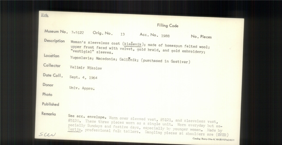 Documentation associated with Hearst Museum object titled Coat, accession number 7-5122, described as Woman's sleeveless coat (klasenik); made of homespun felted wool; upper front faced with velvet, gold braid, and gold embroidery; "vestigial" sleeves. 7-5119-5128 comprise a complete costume. Worn over sleeved vest 7-5121 and sleeveless vest, 7-5120, these three pieces worn as a single unit. Worn everyday but especially on Sunday and for festivals, and especially by younger women. Danglin pieces at sholders are vistigial sleeves which are reduced to present form because they are not used when worn with sleeved vest.Made by Terzija, professional tailors who make folk costumes. Worn by women at time of  collection, 1964.