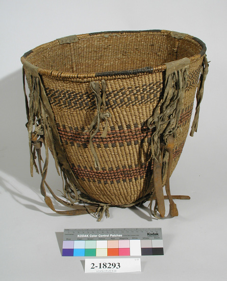 Hearst Museum object 1 of 2 titled Burden basket, accession number 2-18293, described as Twined, buckskin fringe.