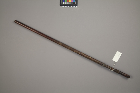 Hearst Museum object 1 of 2 titled Walking stick, accession number 11-14640, described as Wooden cane, sparring/walking/swagger stick; carved and design rubbed with lime