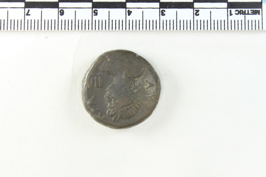 Hearst Museum object 4 of 10 titled Coin: billon tetradrachm, accession number 6-22603, described as obverse: bust of Nero, left. radiate, wearing aegis reverse: bust of Apollo pythia, right