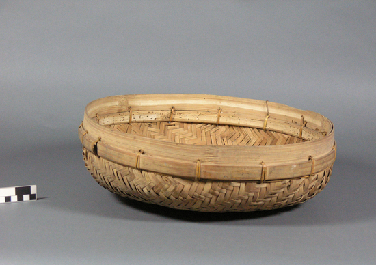 Hearst Museum object titled Basket, accession number 10-10, described as Basket; round; flat bottom; split bamboo; herringbone pattern; bamboo edge ring; 16 inch diameter.