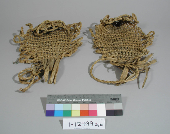 Hearst Museum object titled Moccasins, accession number 1-12499a,b, described as Men's tule moccasins, twined.