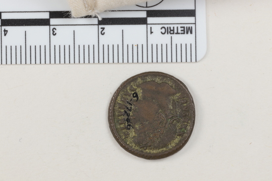Hearst Museum object titled Coin: æ, accession number 6-17246, described as Bronze coin, Roman, marked “Constan”. Obverse: Constantine. Reverse: building (fort?).