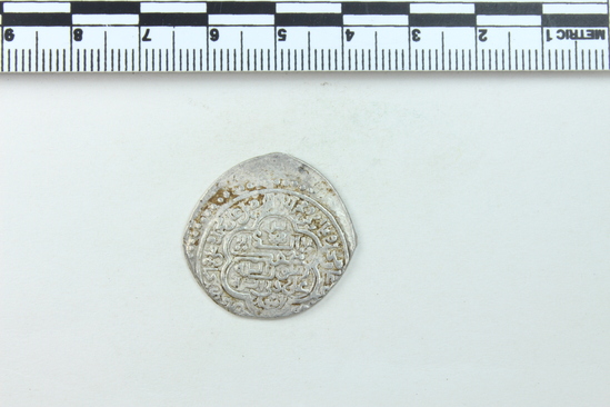 Hearst Museum object 6 of 6 titled Coin: ar double dirhem, accession number 9-7153, described as Silver coin, Double Dirhem, 3.93 gm (Ghazan-Uljaitu II weight standard)