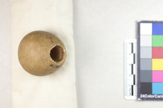 Hearst Museum object titled Mace head, accession number 6-19543, described as alabaster oval ball, perforated, possibly head of a ceremonial stick, maceheads