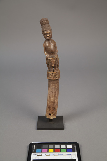 Hearst Museum object titled Figurine and base, accession number 5-4629a,b, described as (a) ivory equestrian figure (b) metal base. One of a pair, possibly handle for fly whisk.