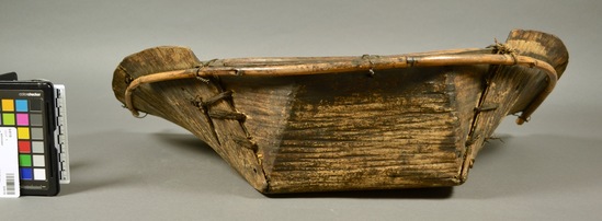 Hearst Museum object 3 of 3 titled Winnower, accession number 9-9119, described as winnower; bark over bamboo frame; scoop shaped with wire repair; winnow; winnowing rice or barley; home product