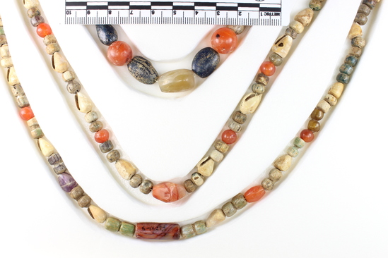 Hearst Museum object 9 of 10 titled Beads, accession number 6-16293, described as Beads: string of shell, carnelian, green stone amethyst, various shapes, l  62 cm. open.