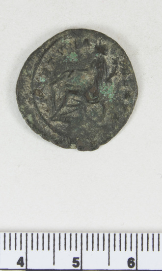 Hearst Museum object 3 of 8 titled Coin: æ, accession number 8-6385, described as Coin: Æ (AR?); Aurelian - 3.82 grms. Obverse: IMP AVRELIANVS AVG - Bust facing right radiate. Reverse: FORTVNA REDVX - Fortuna seated facing left holding rudder and cornucopiae.