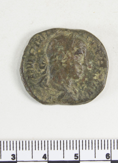 Hearst Museum object 4 of 8 titled Coin: æ sestertius, accession number 8-6355, described as Coin: Sestertius; Æ; Philip I (?) - 15.02 grms. Obverse: IMP MI ... AVG - Bust facing right laureate, draped. Reverse: LIBERTA[LITAS A]VGG - III, SC in exergue - Philip I and II seated facing left on curule chairs, each holding scepter and abacus.