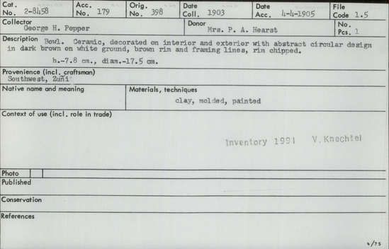 Documentation associated with Hearst Museum object titled Bowl, accession number 2-8458, described as Bowl. Ceramic, decorated on interior and exterior with abstract circular design in dark brown on white ground, brown rim and framing lines, rim chipped. Clay, molded, painted. Height 7.8 cm.; diameter 17.5 cm.