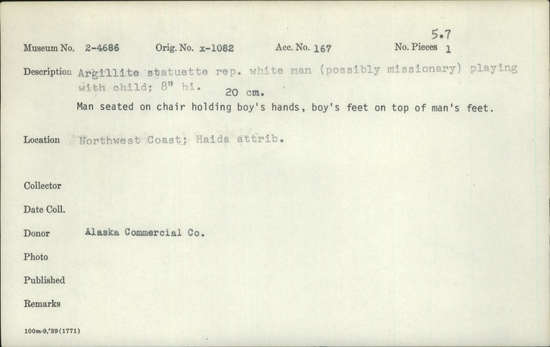 Documentation associated with Hearst Museum object titled Statuette, accession number 2-4686, described as Argillite statuette representing white man (possibly missionary) playing with child.  Man seated on chair holding boy's hands, boy's feet on top of man's feet.
