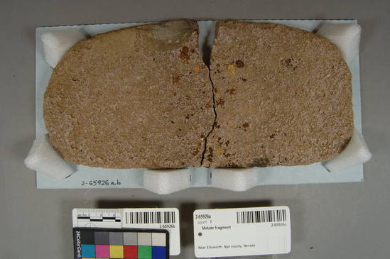 Hearst Museum object titled Metate fragment, accession number 2-65926b, described as Metate; “minimal metate, vasicular basalt; (a) width 13.8 cm (b) width 12.5 cm (joined together, almost complete, form oval with 25 cm).