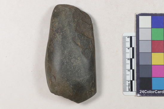 Hearst Museum object titled Adze or axe blade, accession number 16-4582, described as Blade of polished stone axe or adze