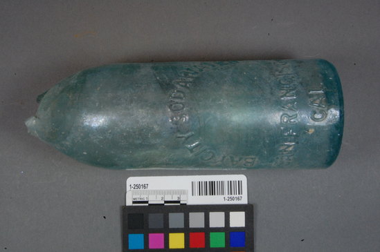 Hearst Museum object titled Bottle fragment, accession number 1-250167, described as 3-part hinge mold embossed soda bottle with maker's mark