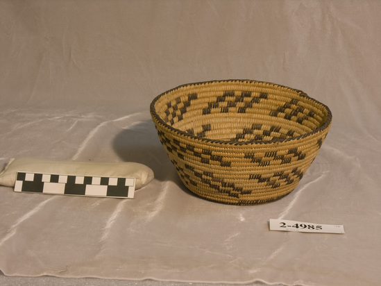 Hearst Museum object titled Basket, accession number 2-4985, described as Coiled white, black design.