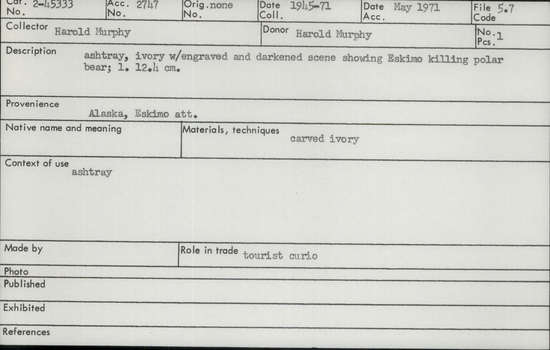 Documentation associated with Hearst Museum object titled Ashtray, accession number 2-45333, described as Made of ivory, with engraved and darkened scene showing Eskimo killing polar bear.