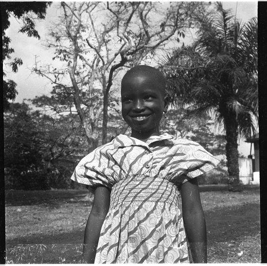 Hearst Museum object titled Black-and-white negative, accession number 15-30796, described as Black and white negative, 2.25" Nigeria, Meko, Ayo - daughter of John (in form out), 1951