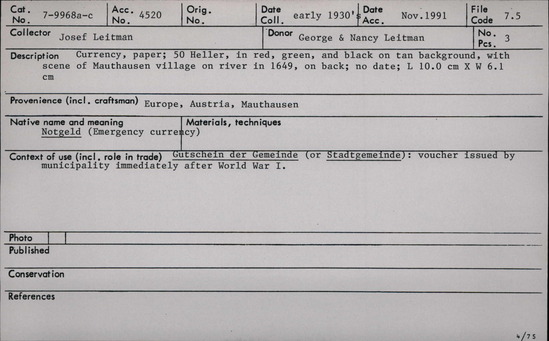 Documentation associated with Hearst Museum object titled Notgeld: 50 heller, accession number 7-9968b, described as Currency, paper. 50 Heller, in red, green, and black on tan background, with scene of Mauthausen village on river in 1649, on back. No date. L 10.0 cm x W 6.1 cm. Native name and meaning: Notgeld (Emergency currency).