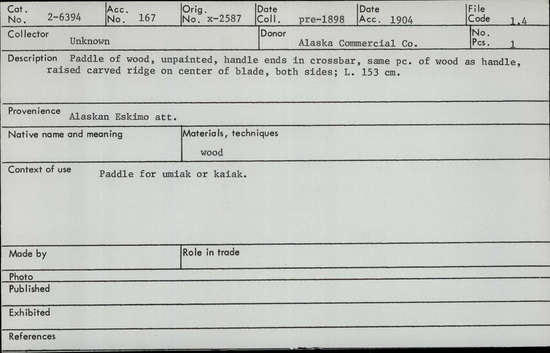 Documentation associated with Hearst Museum object titled Paddle, accession number 2-6394, described as Paddle of wood, unpainted, handle ends in crossbar, same piece of wood as handle, raised carved ridge on center of blade, both sides.