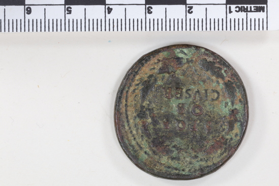 Hearst Museum object 4 of 8 titled Coin: æ sestertius, accession number 8-4001, described as Coin; AE; Sestertius; Roman. Galba, 68-69 AD. Obverse: SER GALBA IMP CAES AVG, Bust r. laureate and draped. Reverse: SPQR/OB/CIV SER in oak wreath