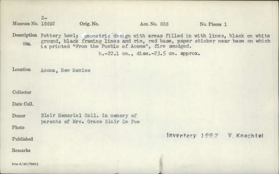 Documentation associated with Hearst Museum object titled Bowl, accession number 2-18692, described as Pottery, geometric design with areas filled in with lines, black on white ground, black framing lines and rim, red base, paper sticker near base on which in printed "From the Pueblo of Acoma", fire smudged.