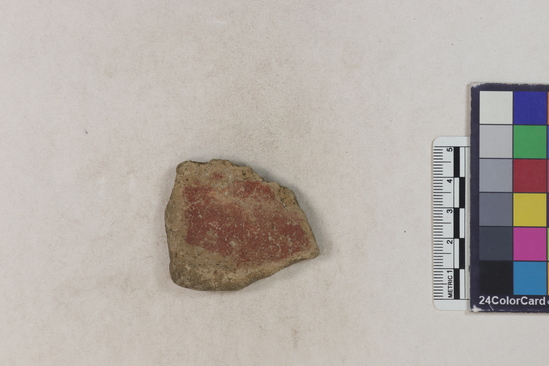 Hearst Museum object titled Potsherd, accession number 16-8184, described as Potsherd: body, red slip Section of Manta on beach currently inhabited. Numbers  8111 to 8194 are sherds picked up on beach at low tide.