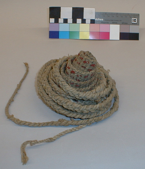 Hearst Museum object titled Band, accession number 2-13269, described as Woven or braided of twine or jute. In red and white.