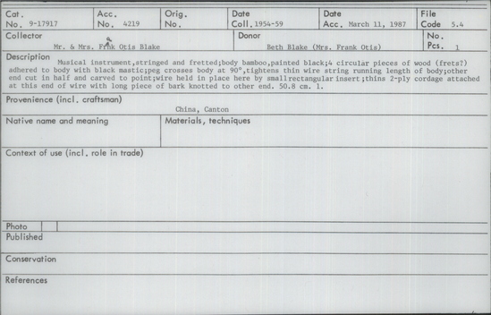 Documentation associated with Hearst Museum object titled Musical instrument, accession number 9-17917, described as Musical instrument, stringed & fretted; body bamboo, painted black; 4 circular pieces of wood (frets?)adhered to body w/black mastic; peg crosses bodyat 90deg,tightens thin wire running length of body;other end cut in half & carved to a pt;wire held in place by insert