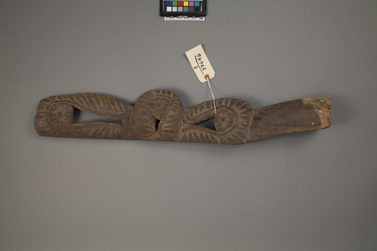 Hearst Museum object titled Canoe prow, accession number 11-37646, described as canoe prow, carved wood; stylized zoomorphic designs carved in relief