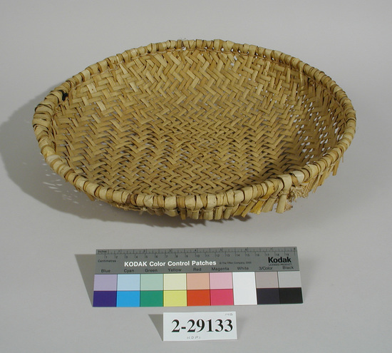 Hearst Museum object titled Basket, accession number 2-29133, described as Round, twill-plaited yucca strips. 2-2-2 weave with single rod rim rod, fag ends looped around and tied down by 2 element twining.