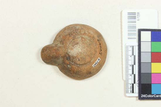 Hearst Museum object 3 of 3 titled Oil lamp, accession number 6-7347, described as Pottery lamp; decoration in relief, 7 x 6 x 2 cm.