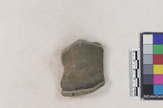 Hearst Museum object 2 of 2 titled Potsherd, accession number 16-8135, described as Potsherd; rim, bottle neck. Numbers  8111 to 8194 are sherds picked up on beach at low tide. Section of Manta on Beach currently inhabited.