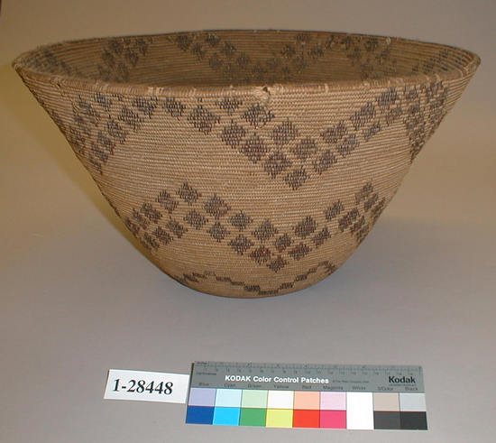 Hearst Museum object 1 of 2 titled Basket, accession number 1-28448, described as Coiled basket, flaring, brown design.