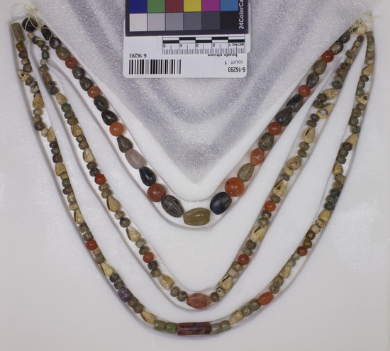 Hearst Museum object 10 of 10 titled Beads, accession number 6-16293, described as Beads: string of shell, carnelian, green stone amethyst, various shapes, l  62 cm. open.