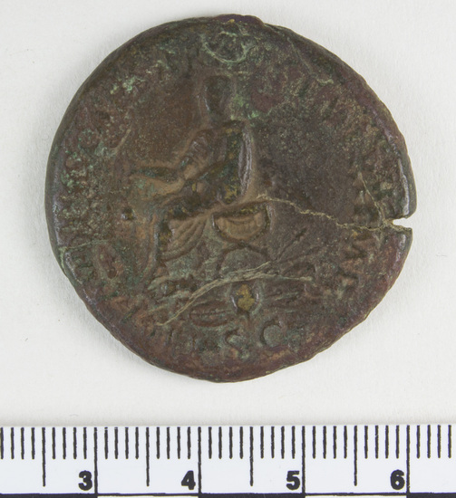 Hearst Museum object 4 of 8 titled Coin: ar, accession number 8-4732, described as Coin; AR; Roman. Claudius, 41-54 AD. Obverse: NERO CLAVDIVS DRVSVS GERMANICVS, bust r. laureate. Reverse: TI CLAVDIVS CAESAR TR P IMP, figure seated l.