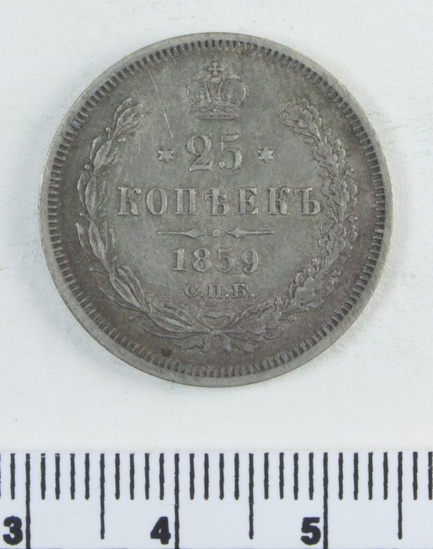 Hearst Museum object 4 of 4 titled Coin, accession number 7-2748, described as Russian coin: obverse: imperial crowned double headed eagle: ЧИСТАГО СЕРЕБРA 1 ЗОЛОТНИКЪ ДОЛЕЙ; translation clean silver 1 zolotnik (a unit of measurement equal to 4.2658 grams) of shareholders (this is a literal translation from a non-native speaker); reverse: ДВАДЦAТЬ ПЯТЬ КОПЪЕКЪ: 1859; C.П.B.; translation: twenty five kopecks C.P.V.; 1859; framed by wreath and topped with crown.